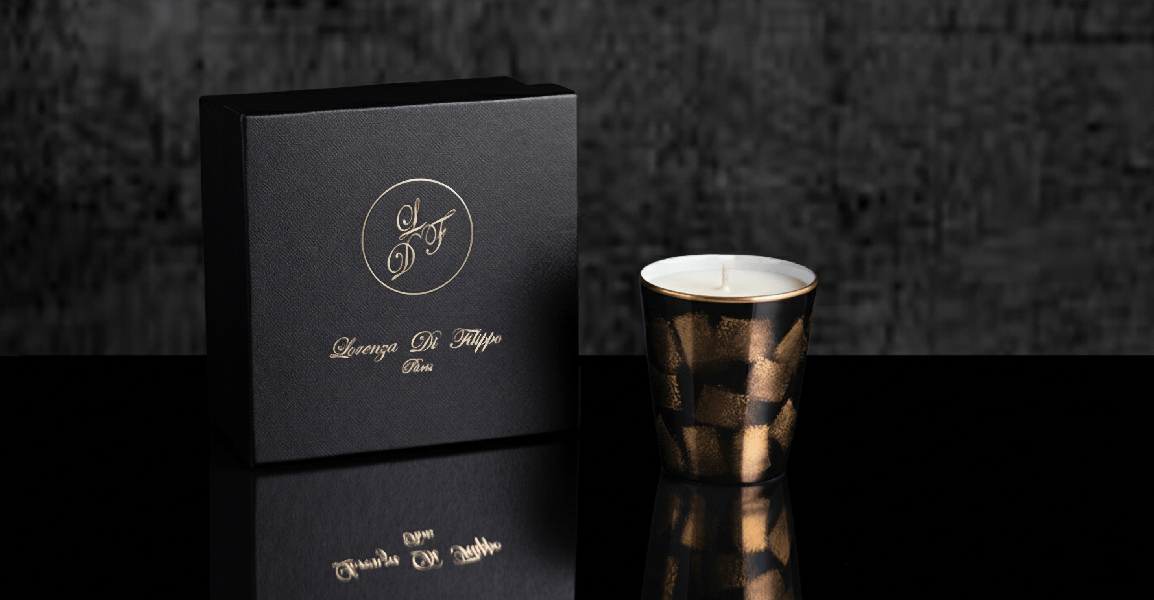 Pot à bougie noir et or au design élégant